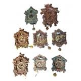 Eight Miniature Decorative Cuckoo Clocks
