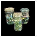 Three Glass Jars Marbles