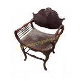 Carved Wooden Armchair with Decorative Back