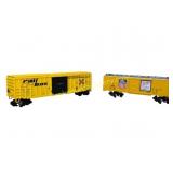 Two Lionel O Gauge Boxcars