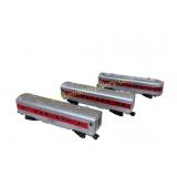 Three Lionel Red Stripe Passenger Cars