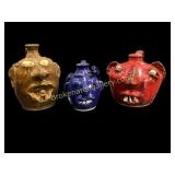 Three Folk Art Pottery Face Jugs
