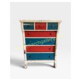 White Wooden Dresser With Red and Blue Drawers