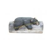 Chainsaw Carved Bear Resting on Log
