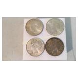Four 1923 Peace Silver Dollars