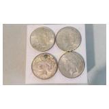 Four 1923 Peace Silver Dollars