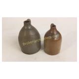 2 Stoneware Fluid Jugs