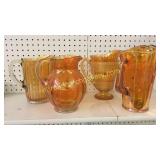 4 Merigold Carnival Glass Pitchers