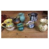 7 Miniture Pottery Pitchers