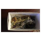 Small box of Assorted costume jewelry