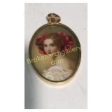 Hand Painted Portrait in 14 k Gold Locket