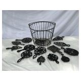 CAST IRON TRIVETS AND EGG BASKET