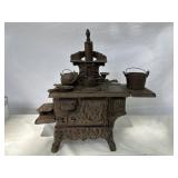 Crescent cast iron miniature stove