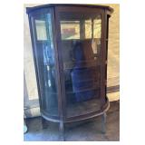 Antique curved front China cabinet