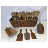 Primitive wooden basket of utensils (30)