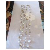 Pearl and shell necklace (opera length) Pearl and shell necklace (opera length)