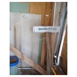 Office sign on post, lumber, drywall