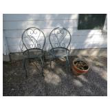2 metal patio chairs, pottery flower pot