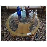 Round Mid-Century blonde glasstop coffee table