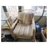 Bamboo patio chair, throw blanket
