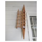 Large outrigger canoe figure