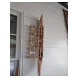 Large outrigger canoe figure