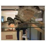 Aardvark figure, palm and feather fan, arrow