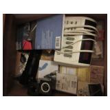 Contents of desk: office supplies, clock,