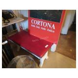 Wooden bench with padded seat