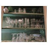 Contents cupboard and counter: vintage stemware,