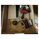 Contents of desk: office supplies, calculator