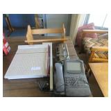 Paper cutter, wooden book rack, hole punch, phone