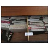 Contents right side of dresser: VHS tapes, DVD"s