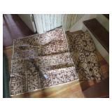 2 tapa cloths, outrigger canoe figure