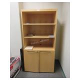 Bookcase with lower storage and cable holes
