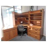 Corner desk with bookshelves, office chair