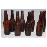 8 Wisconsin Embossed Brown Glass Bottles: