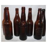 7 Brown Embossed Glass Wisconsin Bottles: