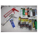 15 Calk tubes and 2 Guns