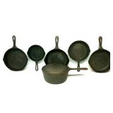 (5) Cast Iron Skillets & (1) Cast Iron Pot w/ Lid