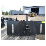 Skid loader hitch attachment