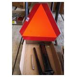 Slow Moving Vehicle sign, air pump