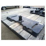 Skid loader hitch attachment