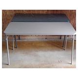 (2) 48" x 20" Folding Tables (The black table has