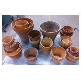 Round clay planters various sizes