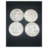 Group of 4 Ben Franklin silver half dollars