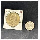 Eisenhower dollar and bicentennial quarter