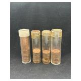4 partial rolls of wheat cents from left to right
