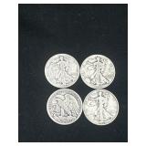 Group of 4 Walking Liberty silver half dollars