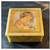 Small trinket of mother and child, approximately